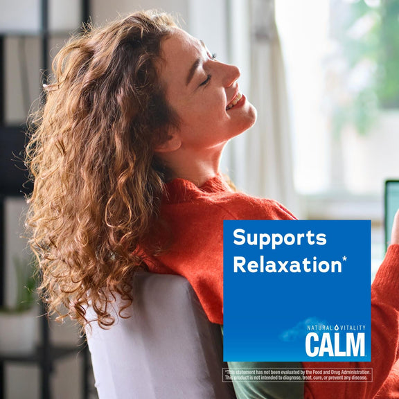 View 5 Adult woman relaxing, her head back and eyes closed, next to a blue label for Natural Vitality Calm.