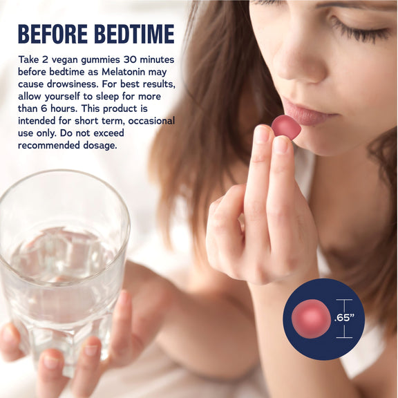 View 3 A young woman takes a melatonin gummy while holding a glass of water.